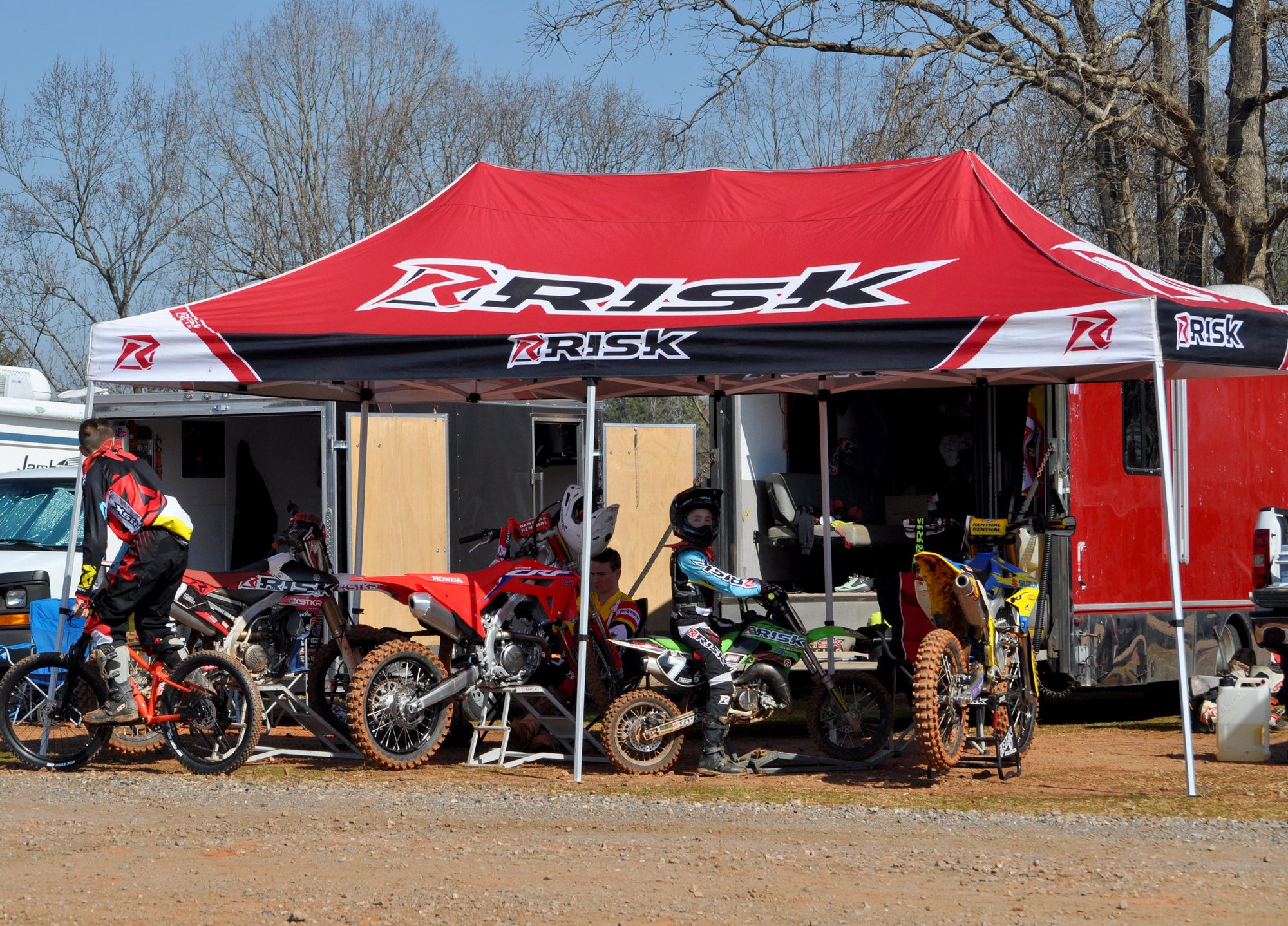 Risk Racing Team Pit Setup covered by a 10 x 20 Factory Pit Tent Canopy
